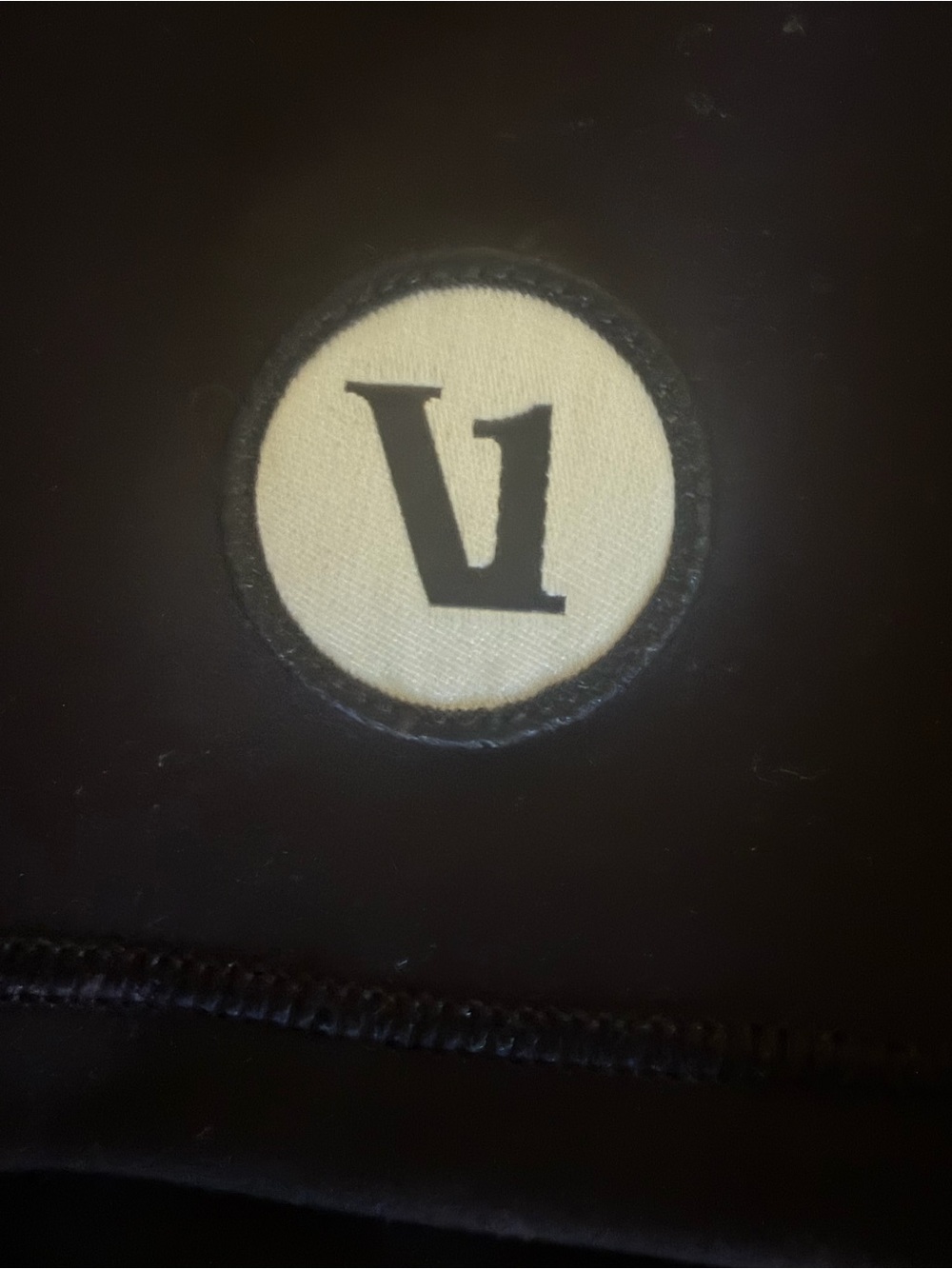 Vuori Black all the form tennis Skirt with White Logo Patch